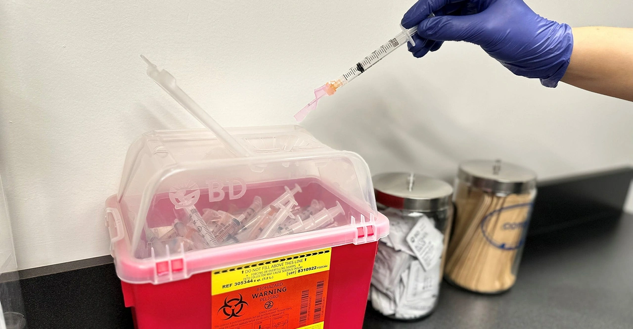 Never Recap Needles Place In Sharps Container