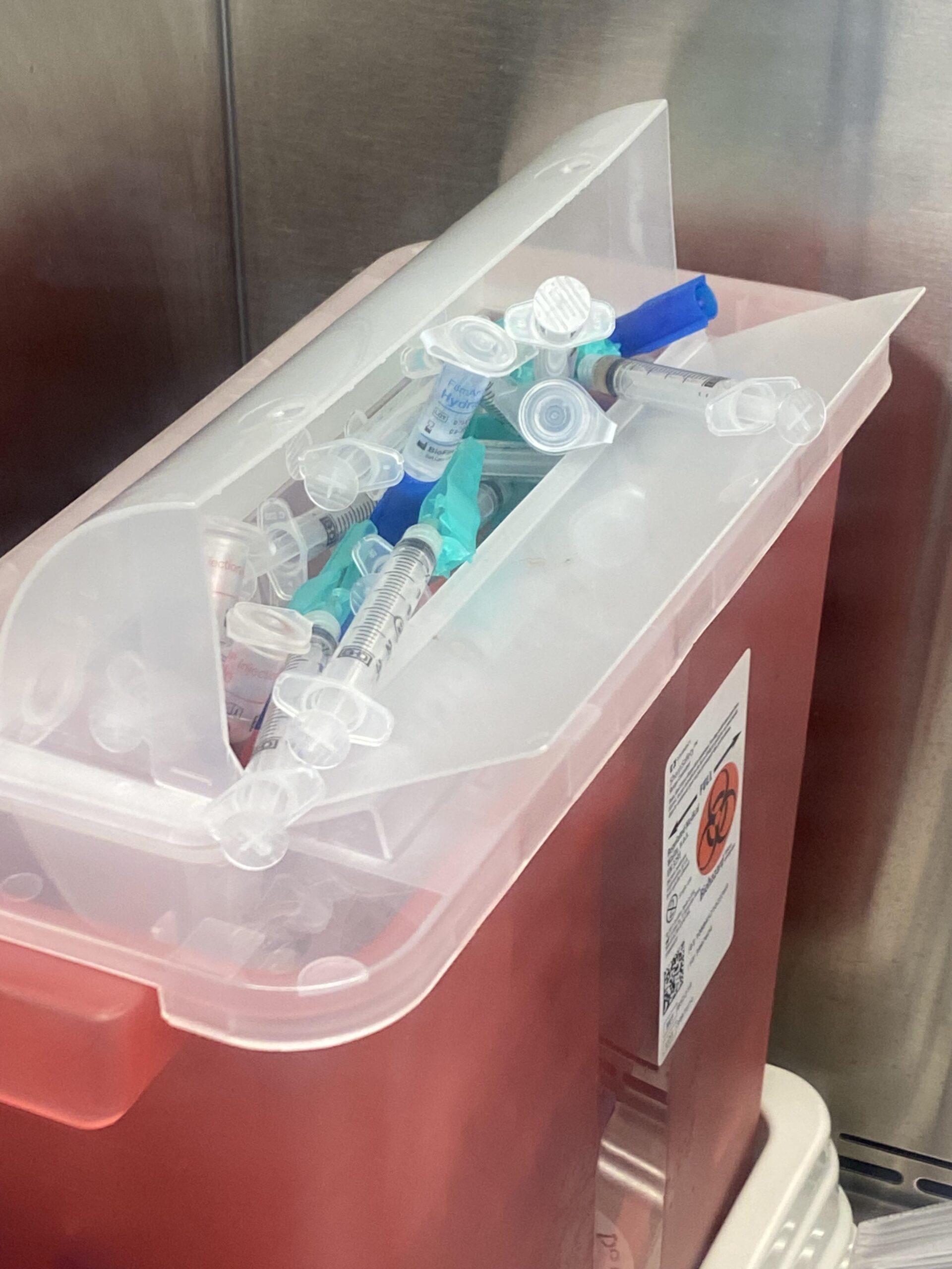 Overfilled sharps container - Secure Waste Overfilled sharps container